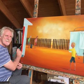 William Linford in the studio, painting for Summer of Sport Exhibition 2