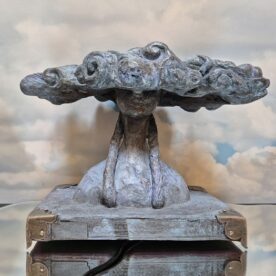 Larissa Gray, Head in the Clouds, Bronze on painted book, Unique, H16 x W24 x D14cm, $4,400